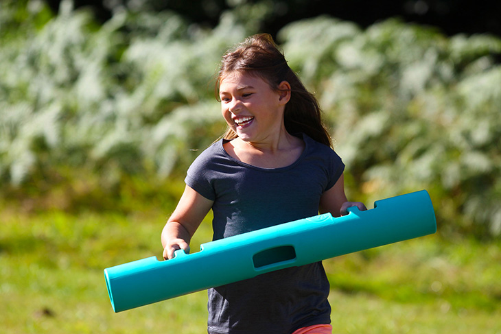 Child holding 2KG ViPR